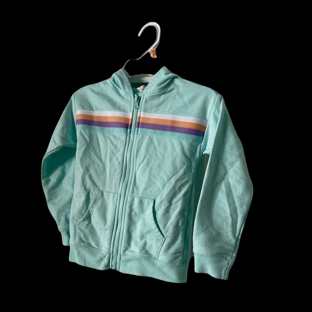 Ideology Girls zip-up hooded sweatshirt with rainbow stripe and front pockets.